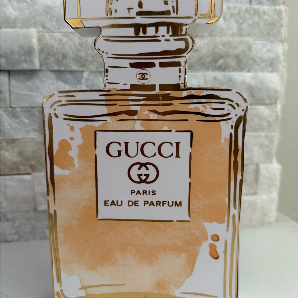Gucci Paris Eau de Parfum with Gold and Tan Hues